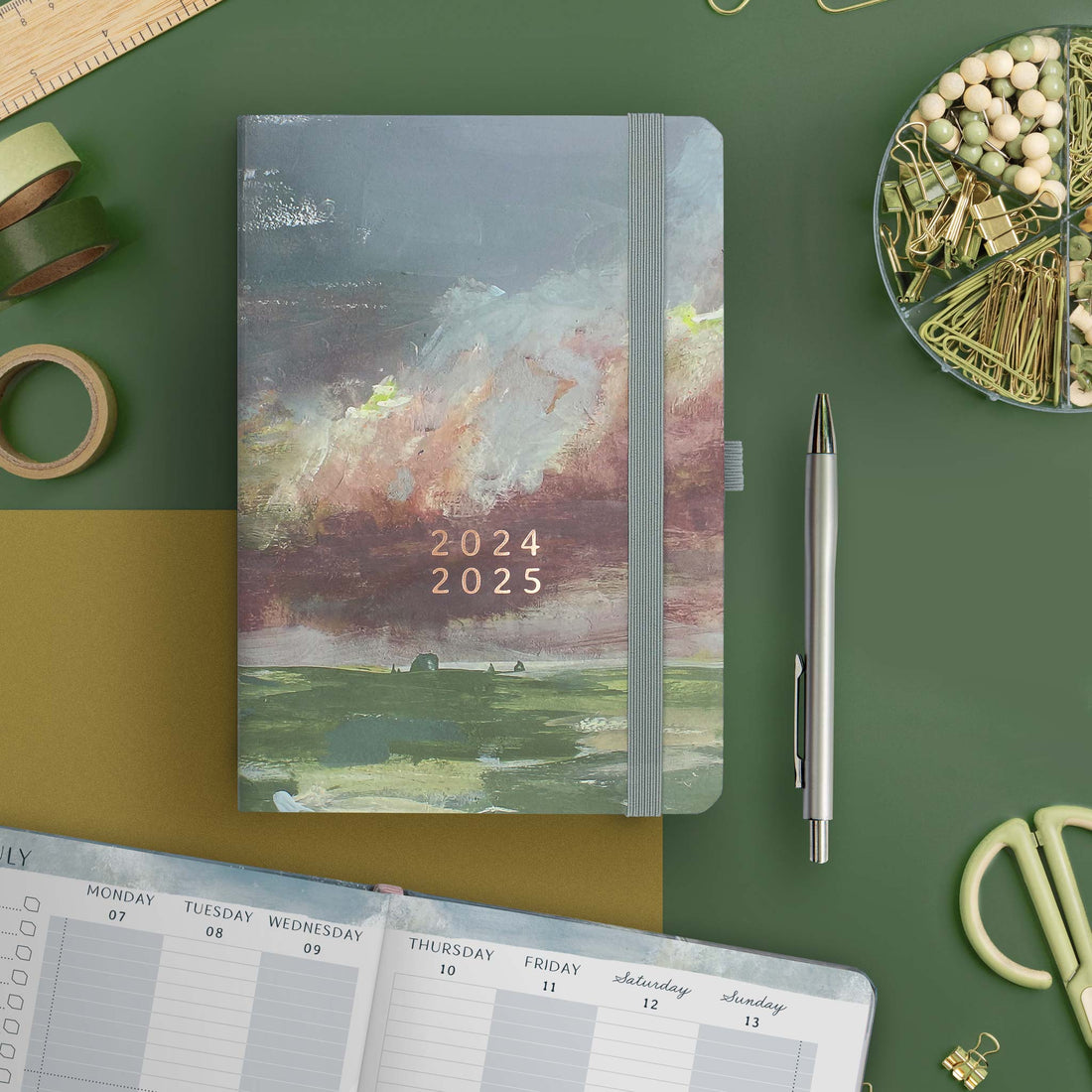 A5 weekly planner with vertical layout and cloud design