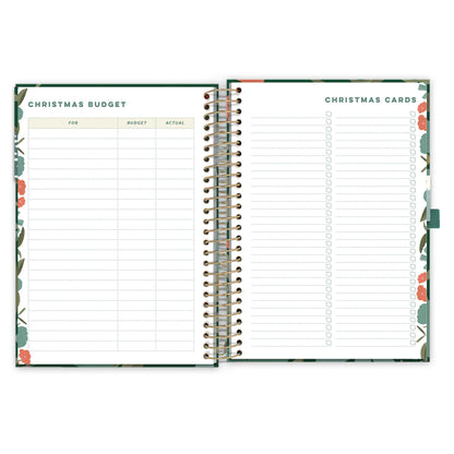 An open diary planner page with a Christmas budget page and Christmas cards list