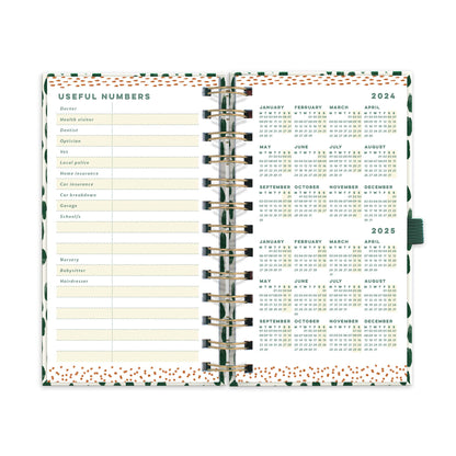 An open diary planner with a useful numbers page and a page with year microcalendars for 2024 and 2024