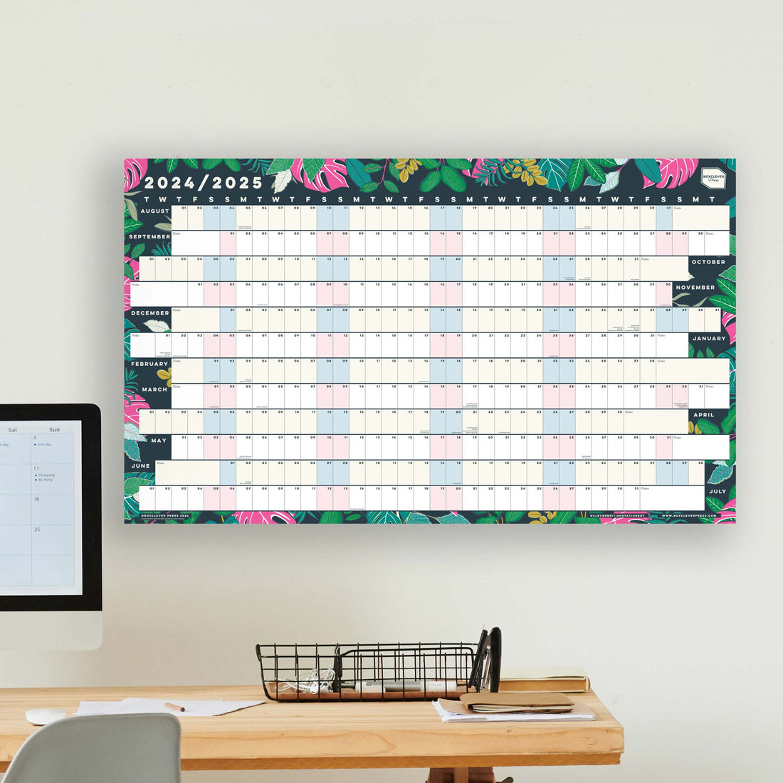 Student wall planner with leaf design hung above a wooden table