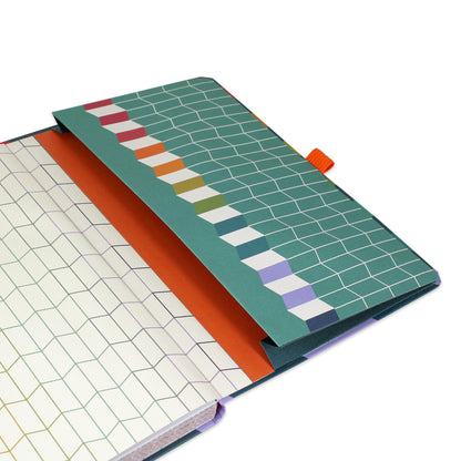 A back diary pocket with geometric pattern and an orange pen loop.