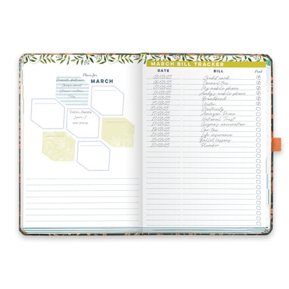 An open diary planner with a monthly plans page and a monthly bill tracker.
