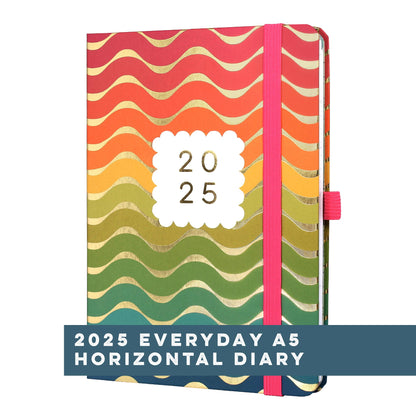 Boxclever Press Everyday A5 Horizontal Diary 2025 in a pink and rainbow design.