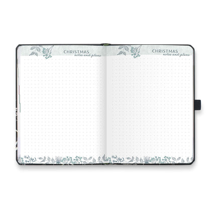 An open diary with dotted Christmas notes and plans pages