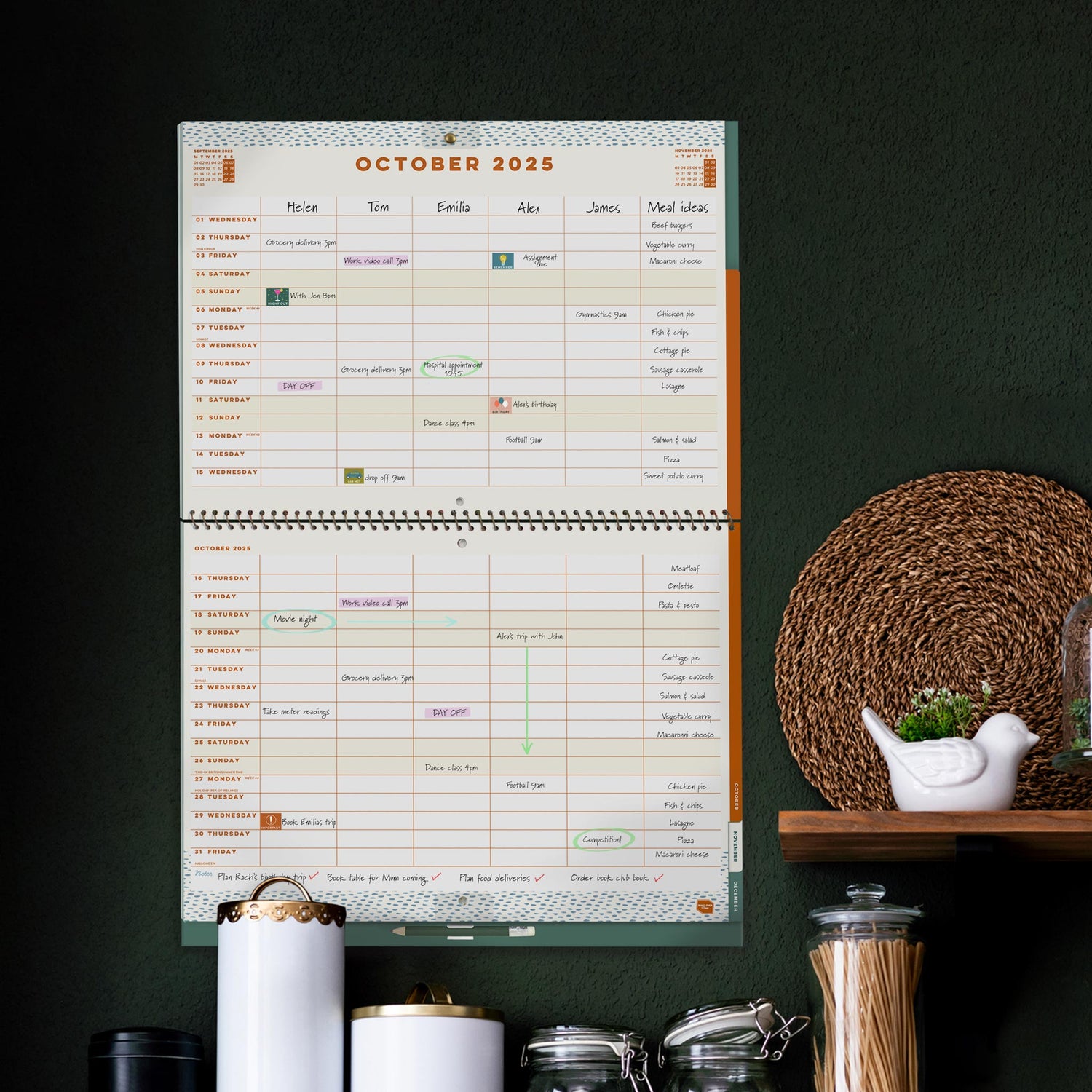 Family home planner with 6 column layout hung on a kitchen wall. 