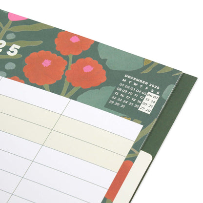 A calendar page with flowers on it and a microcalendar for December 2025 