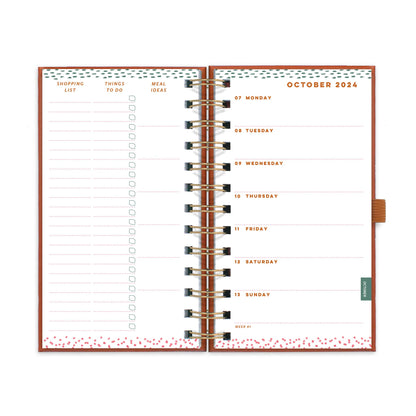 A week to view double page diary spread with a diary page on the right and lists for shopping, to dos and meals on the left