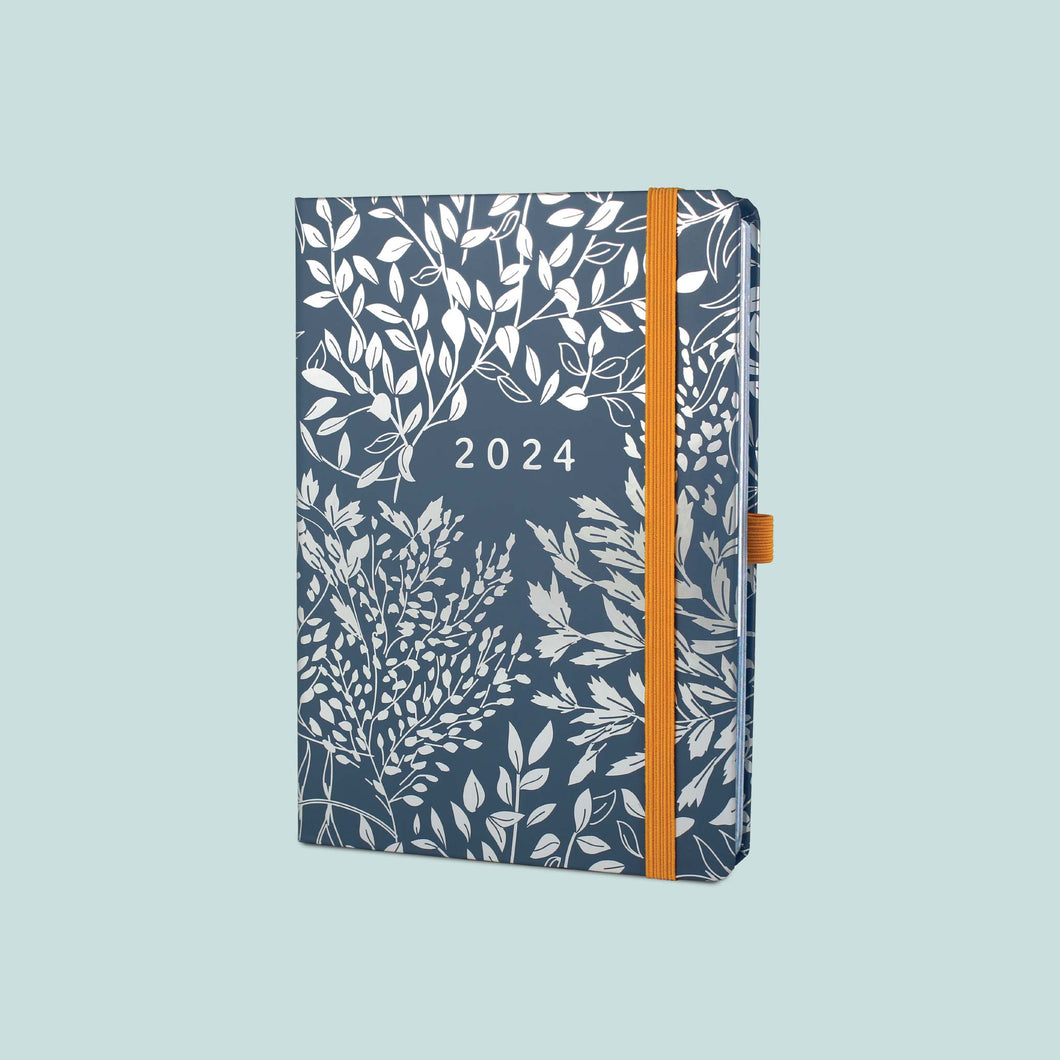 Perfect Year A5 diary planner 2024 with dark blue background, silver leaf patterns and orange bandeau and pen loop