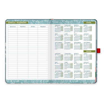 An open diary planner with a page for useful numbers and and a page with year micro calendars for 2025 and 2026.