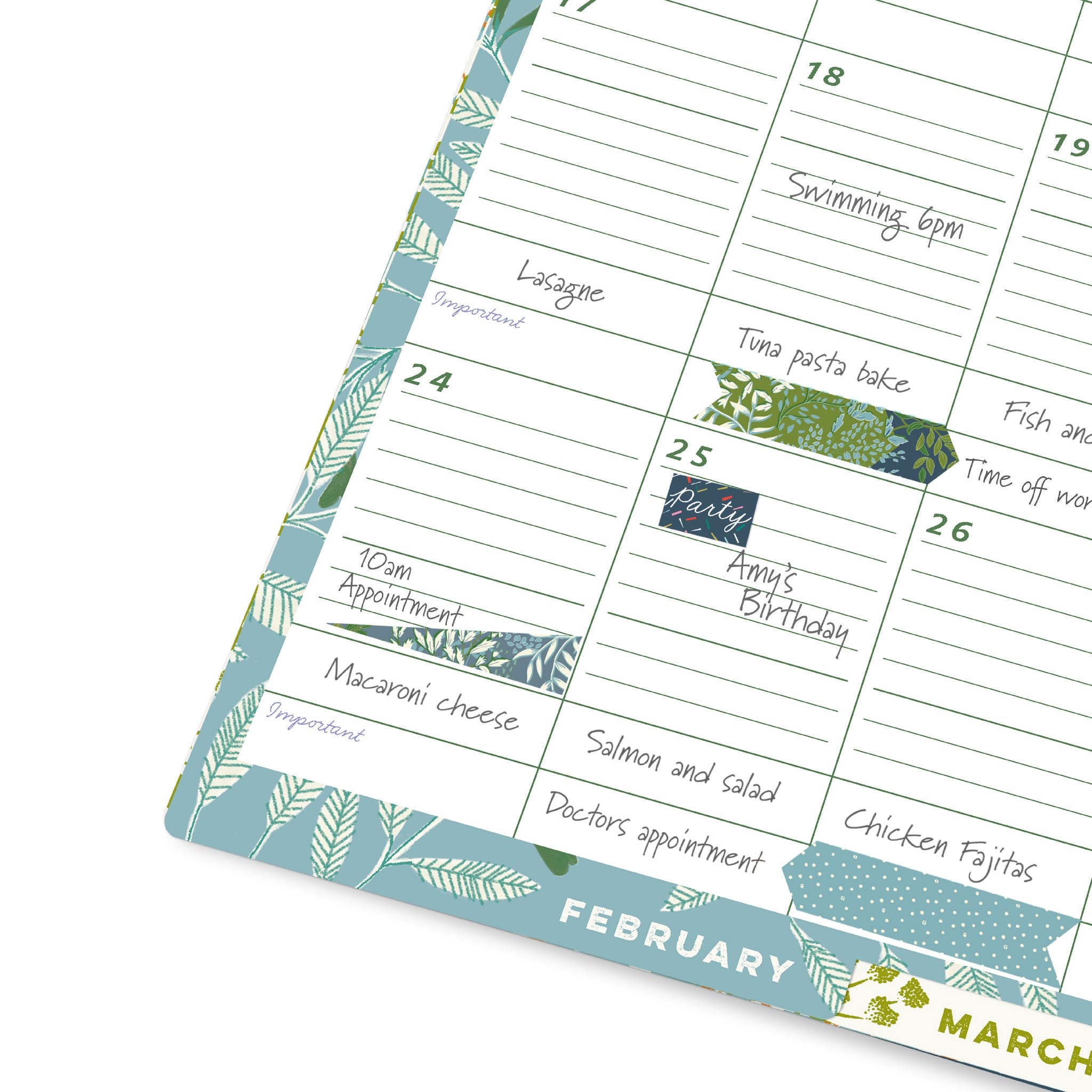 Close up of the monthly tabs at the bottom of the calendar, large lined appointment boxes, boxes for important plans and stickers.